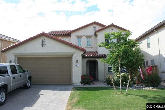 410 Stradella Court Reno, NV 89521 - Photo 1 of 9 a front view of a house with a yard