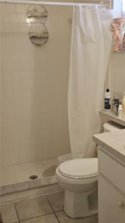 871 Reflections Loop East Winter Haven, FL 33884 - Photo 8 of 9 a white toilet sitting next to a bathroom sink