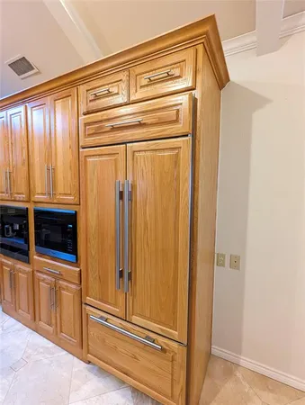 a view of a door and an empty room