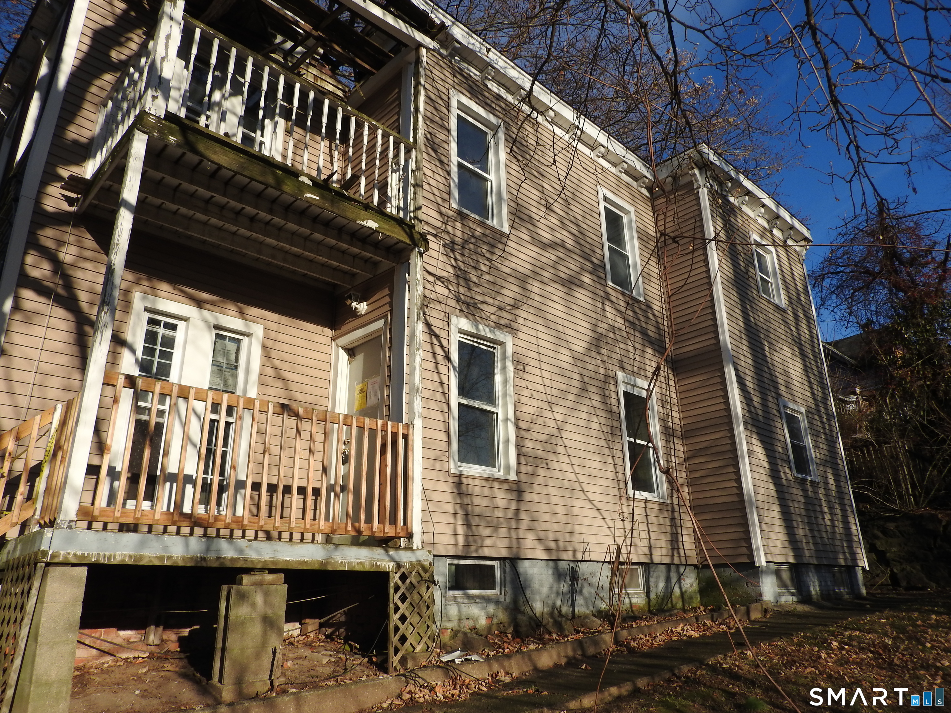 11 Division Street Norwich, CT 06360 - Photo 2 of 10 a view of a large building