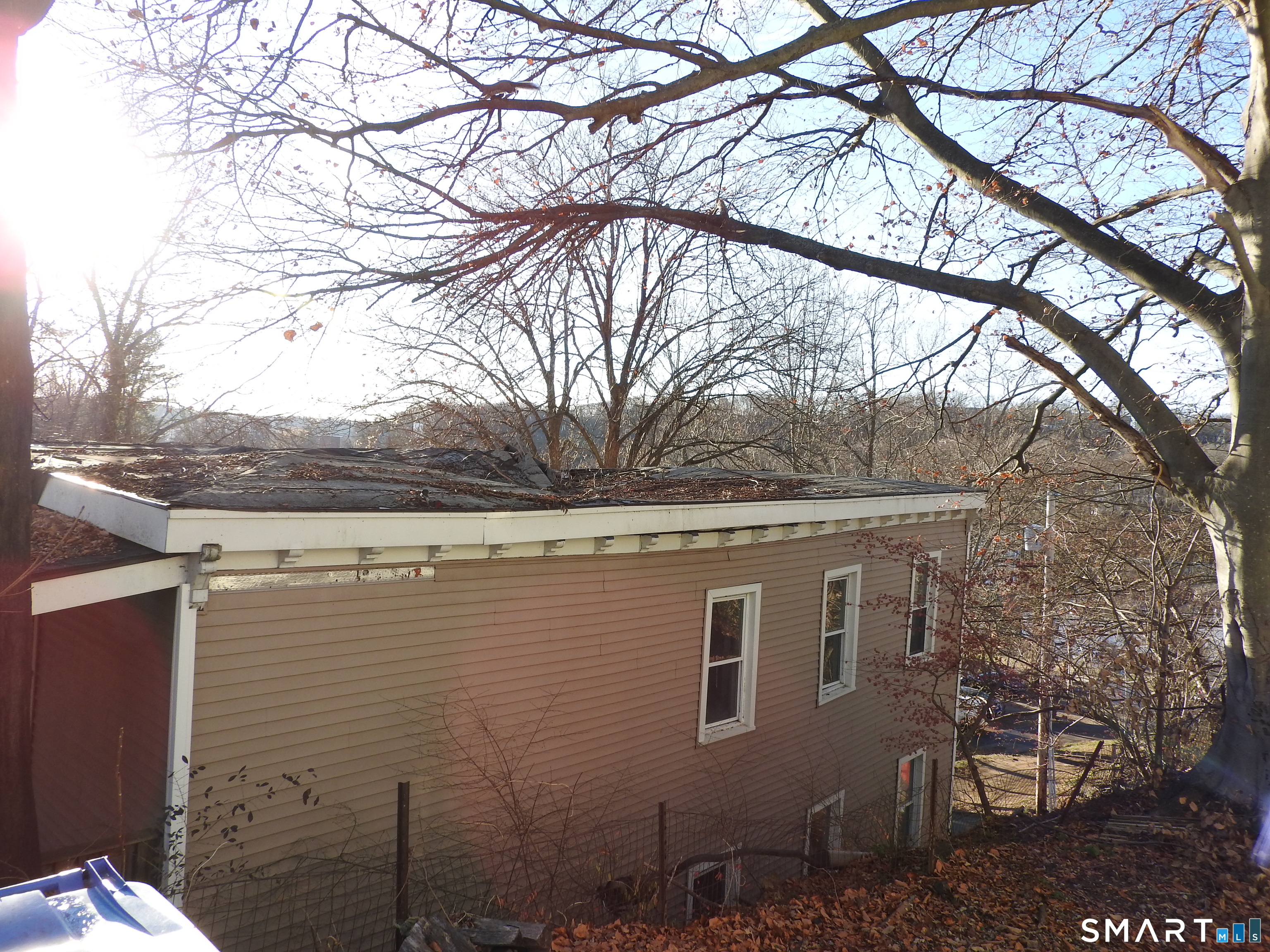 11 Division Street Norwich, CT 06360 - Photo 10 of 10 a aerial view of a house with a yard
