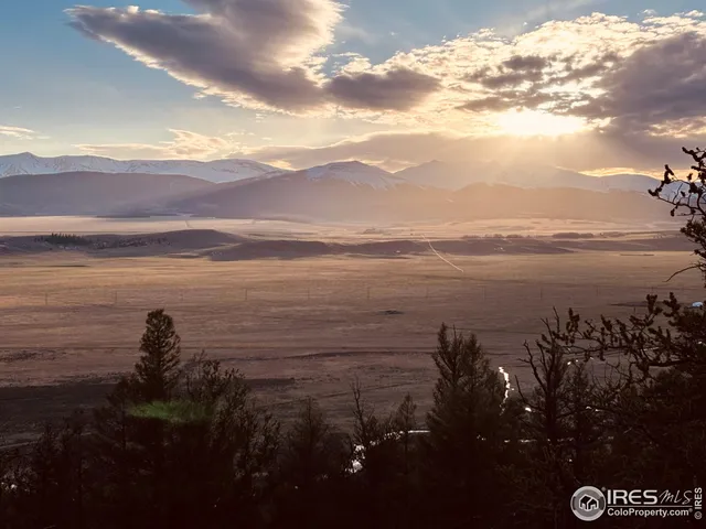 a view of lake and mountain