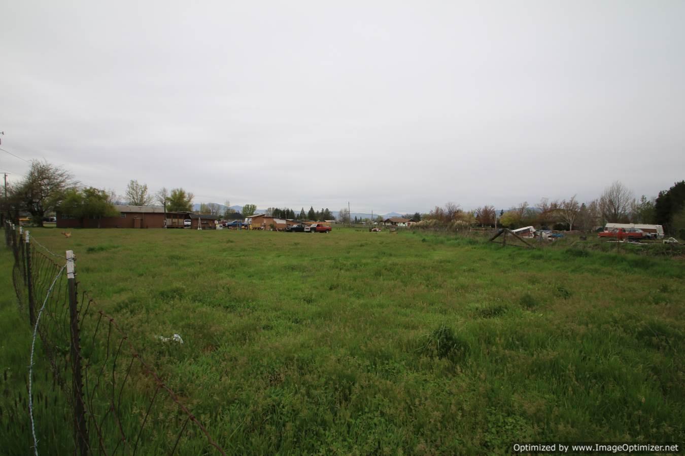 2531 East Gregory Road Central Point, OR 97502 - Photo 16 of 21 a view of a grassy field