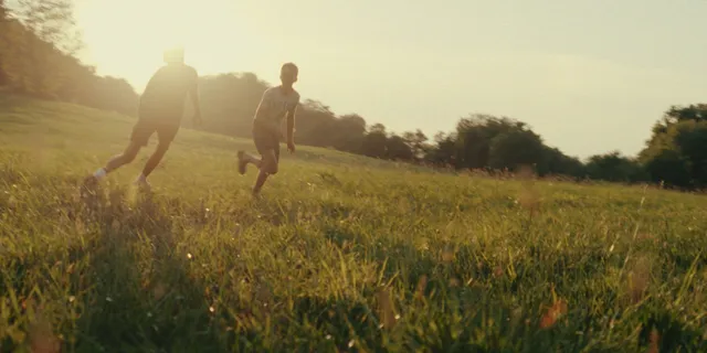 a view of an ocean and a yard