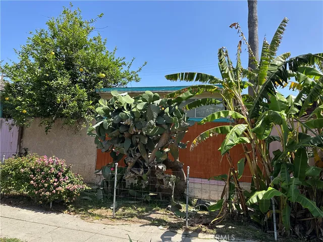 an aerial view of residential houses and outdoor space