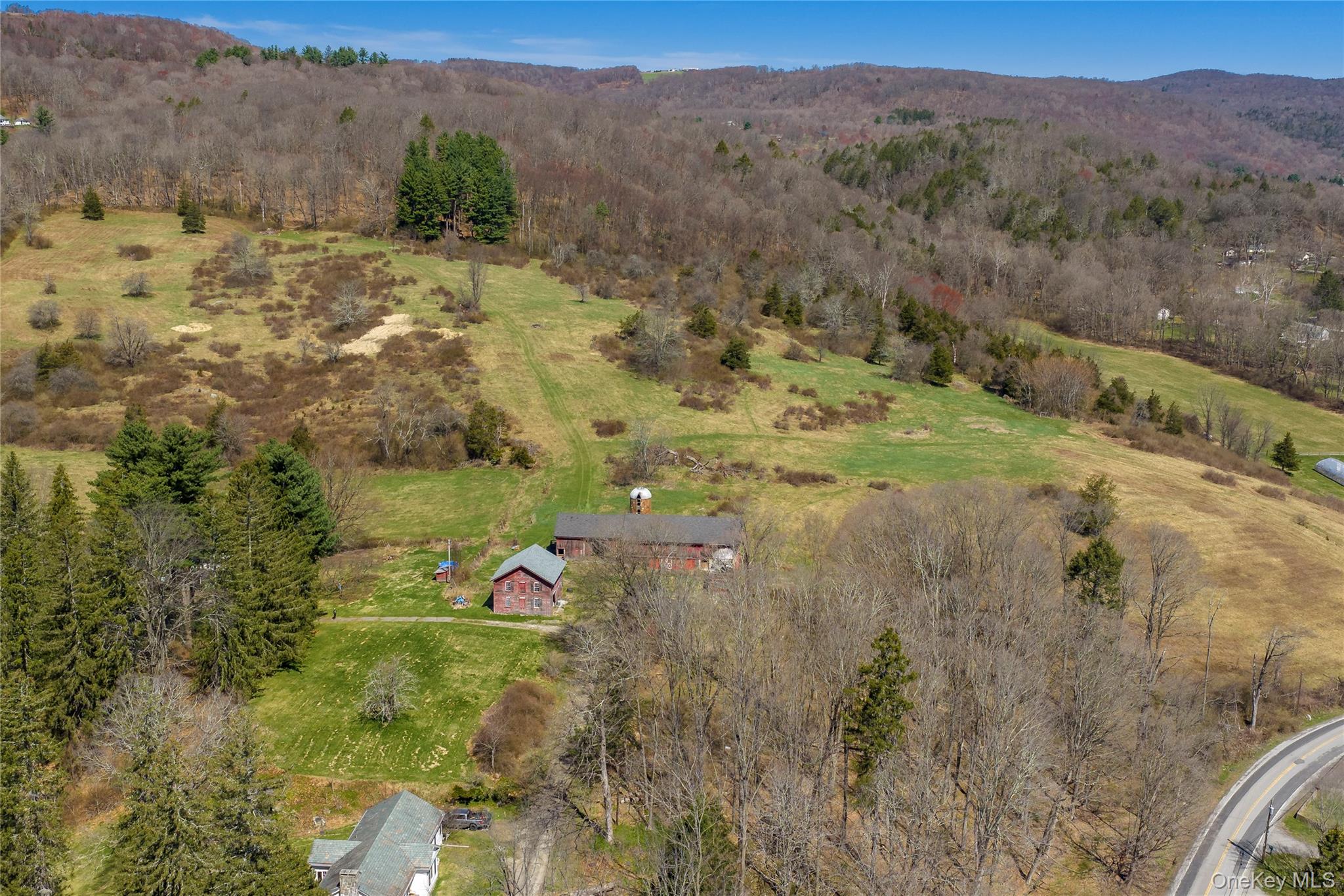 21-23 Tinker Town Road Dover Plains, NY 12522 - Photo 6 of 26 The largest parcel, spanning 88.46 acres, offers a beautiful mix of approximately 25 cleared acres and expansive mature hardwood forest.