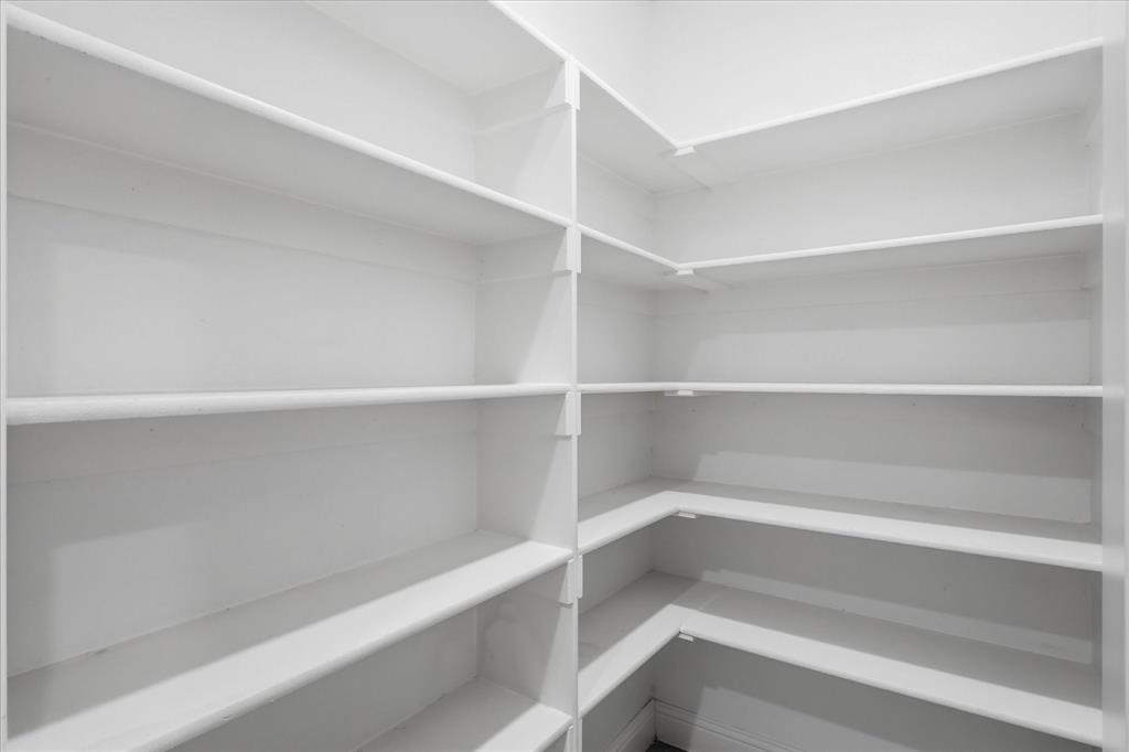 519 Sequoia Street Allen, TX 75002 - Photo 15 of 38 Spacious walk-in pantry featuring abundant white shelving for organized storage