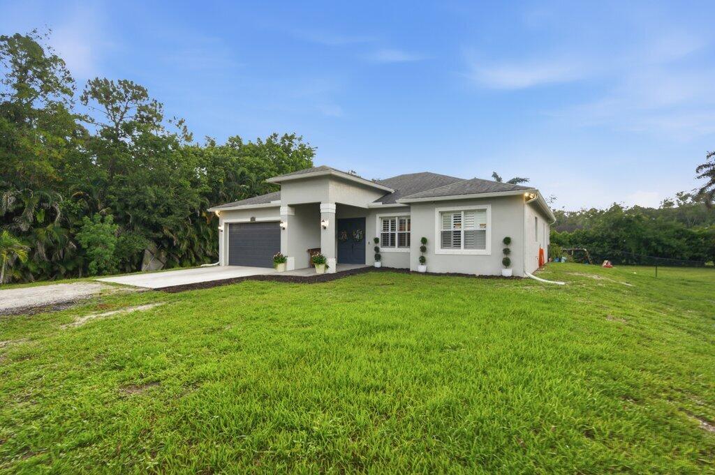 18310 42nd Road North The Acreage, FL 33470 - Photo 3 of 47 18310 42nd Rd N-45.jpg-SMALL