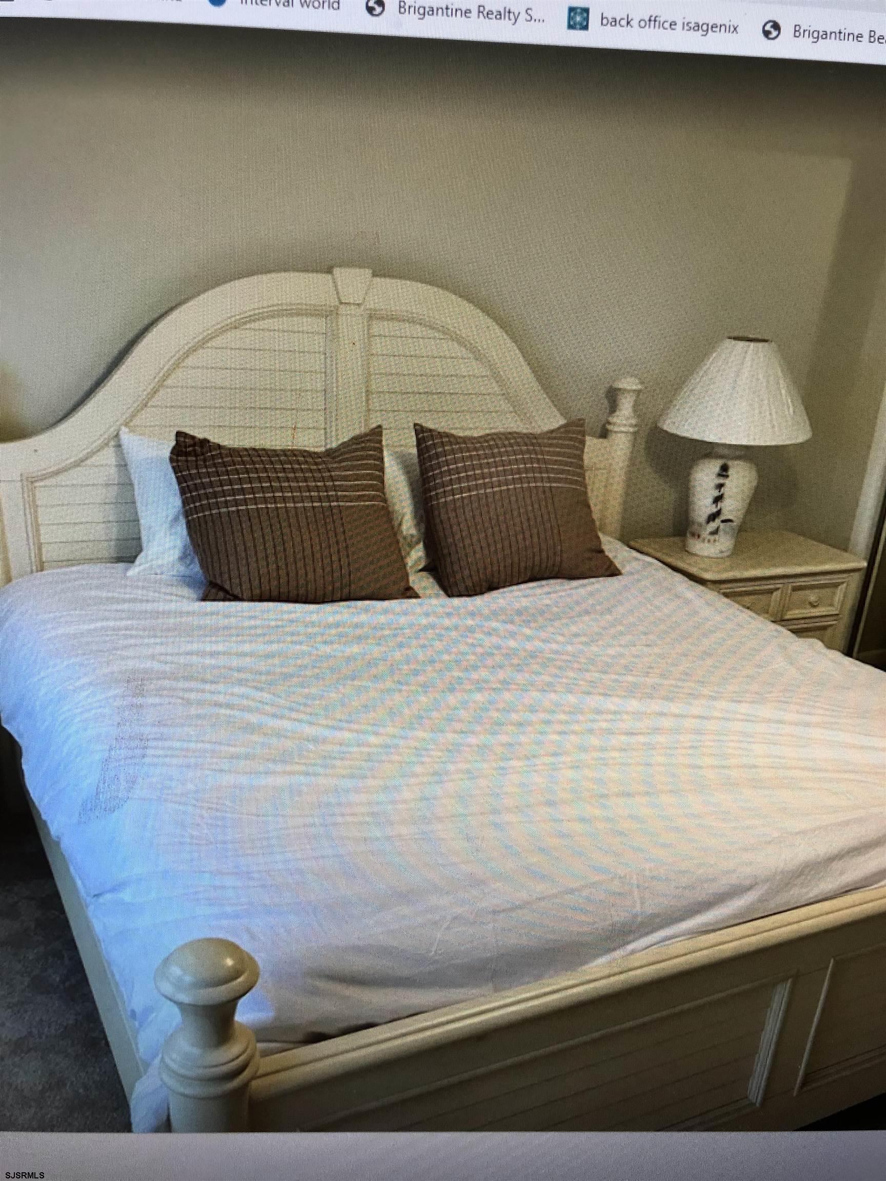 217 3rd Street South, Unit A Brigantine, NJ 08203 - Photo 9 of 10 a bedroom with a bed and a window