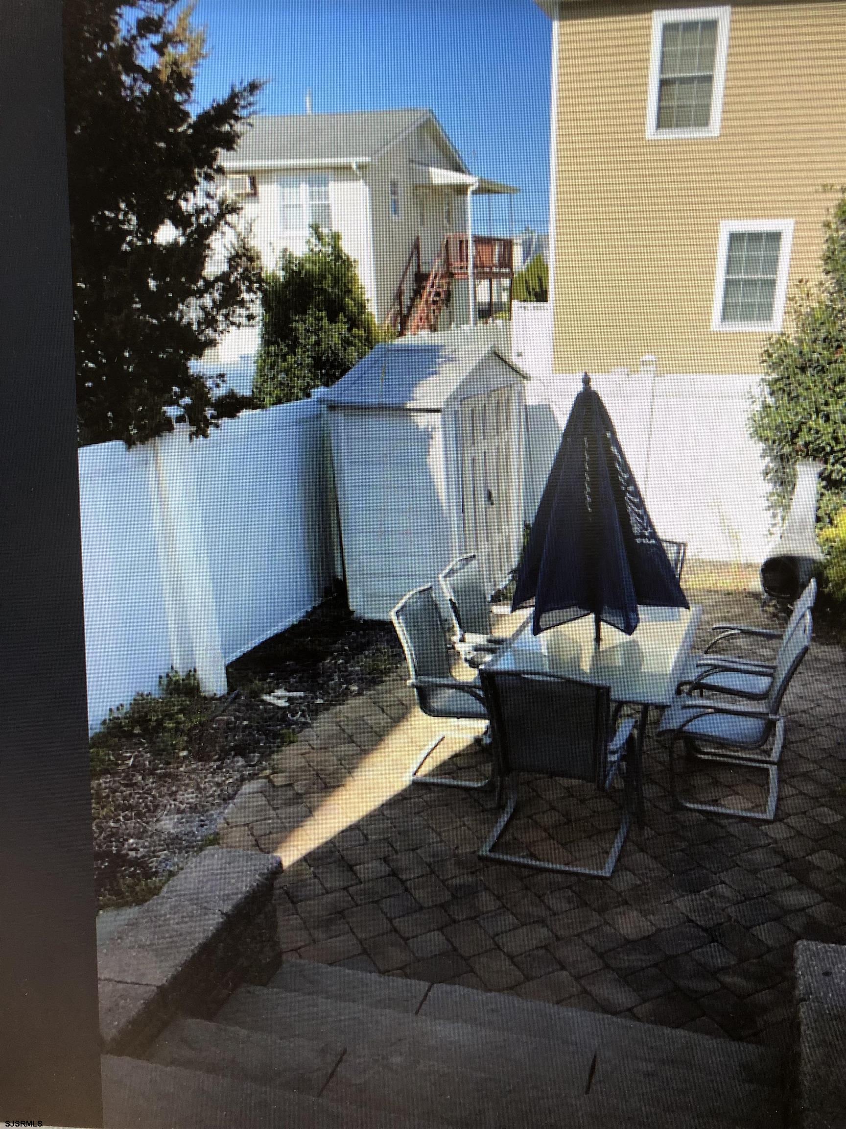 217 3rd Street South, Unit A Brigantine, NJ 08203 - Photo 10 of 10 a view of a outdoor sitting area with furniture
