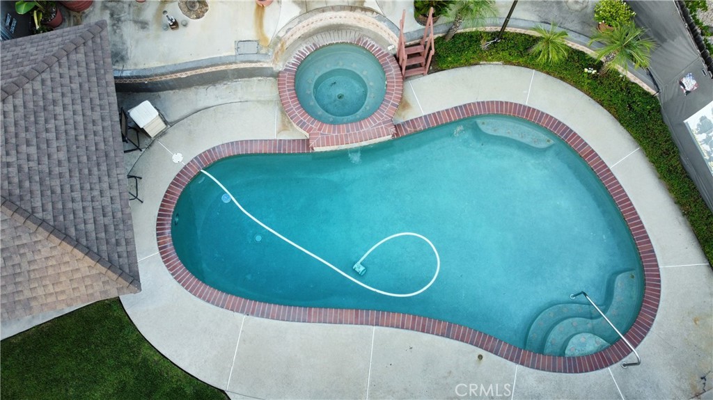 7153 Walcott Place Rancho Cucamonga, CA 91739 - Photo 33 of 35 an aerial view of a house with swimming pool and outdoor seating