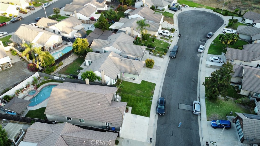 7153 Walcott Place Rancho Cucamonga, CA 91739 - Photo 34 of 35 an aerial view of a house with a yard and garden