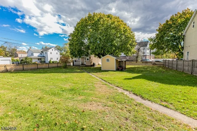 a view of a yard with a house
