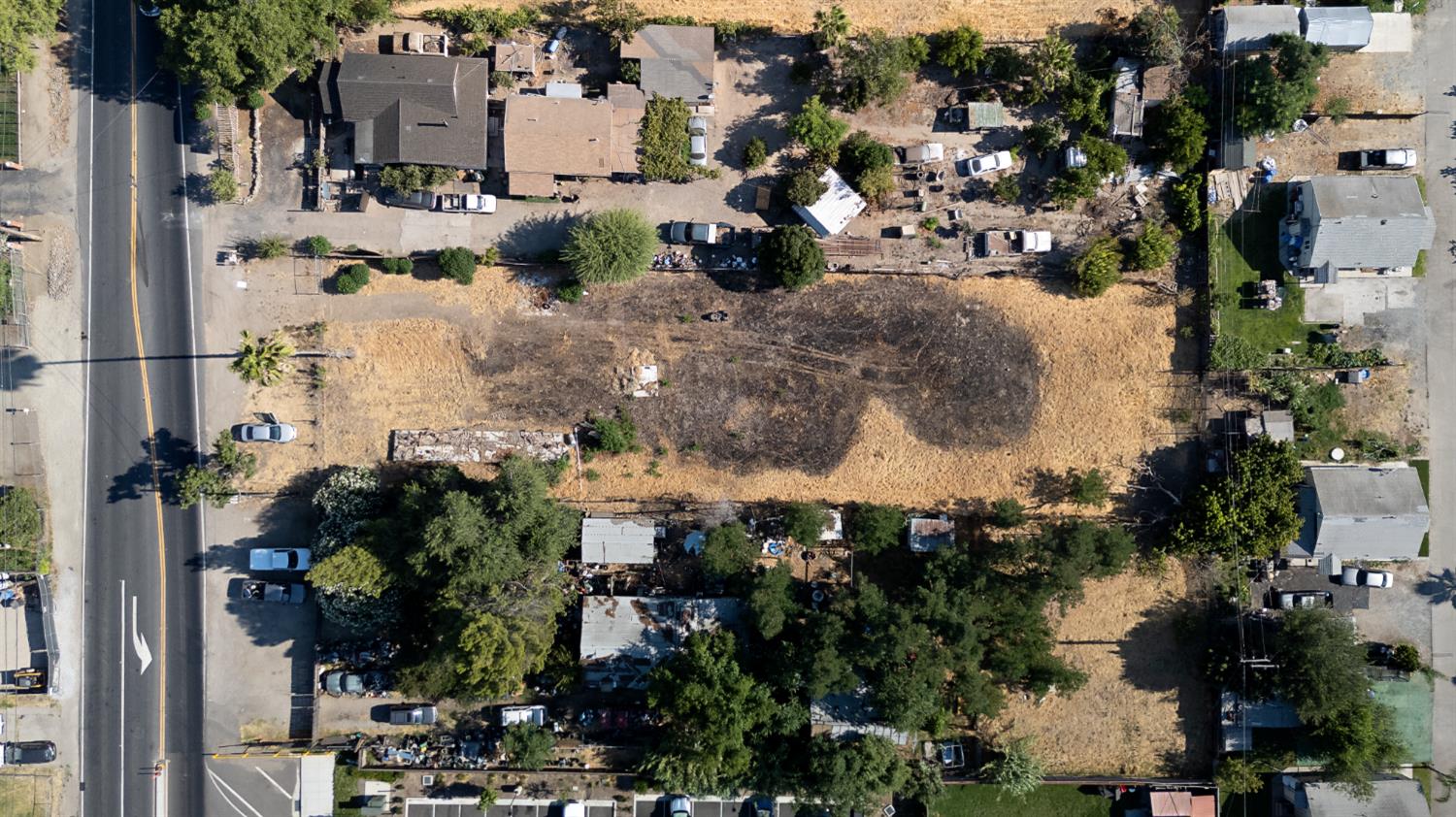 154 Airport Way Manteca, CA 95337 - Photo 10 of 11 an aerial view of residential houses with outdoor space
