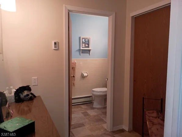 a bathroom with a toilet