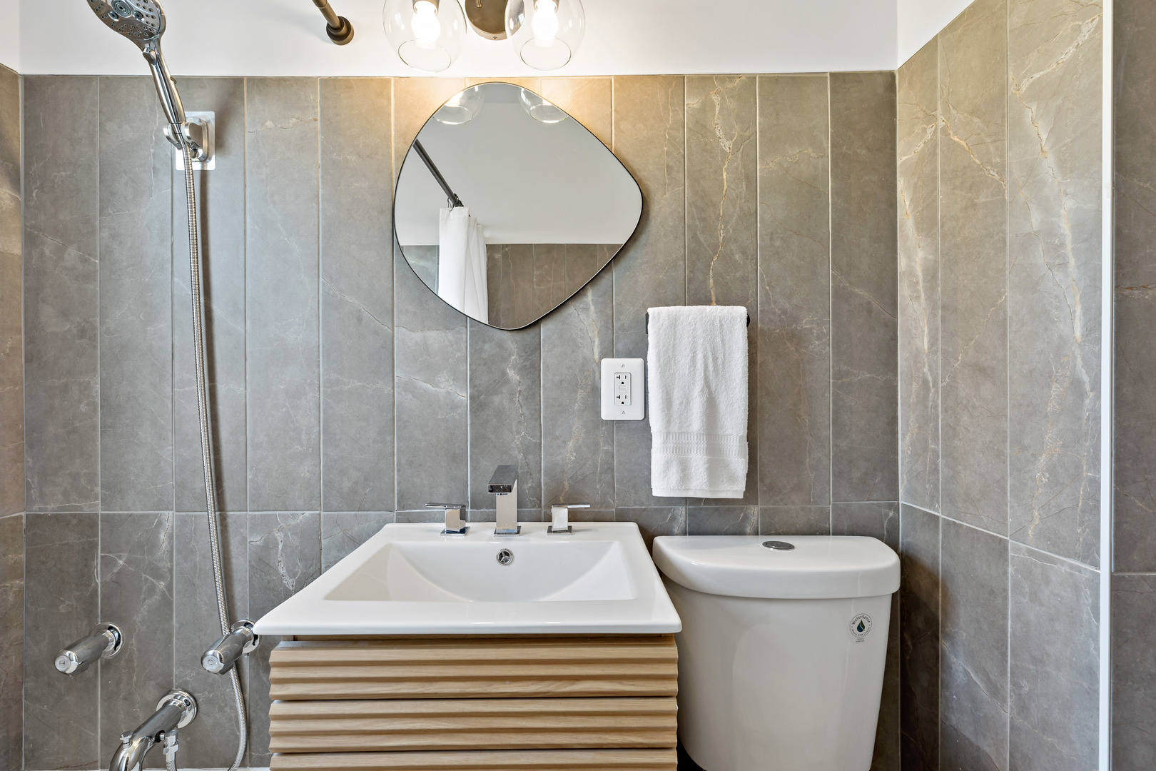 3634 177th Street Lansing, IL 60438 - Photo 15 of 15 a bathroom with a sink and a mirror