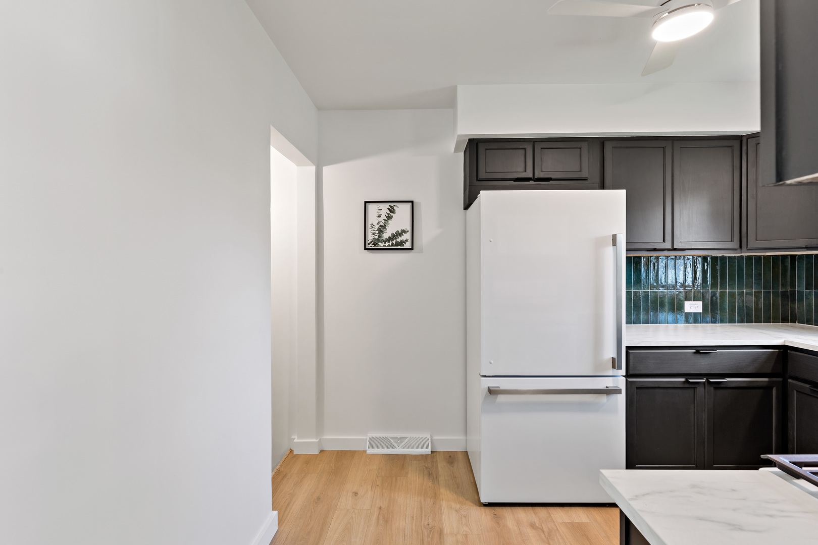 3634 177th Street Lansing, IL 60438 - Photo 7 of 15 a white refrigerator freezer and a stove sitting inside of a kitchen