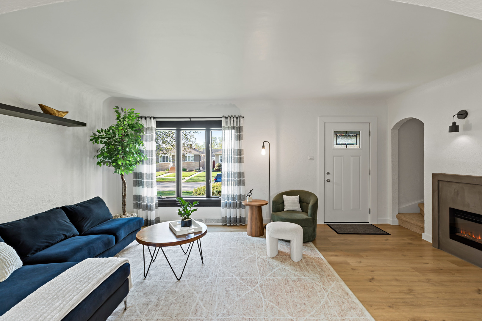 3634 177th Street Lansing, IL 60438 - Photo 8 of 15 a living room with furniture potted plant and a fireplace