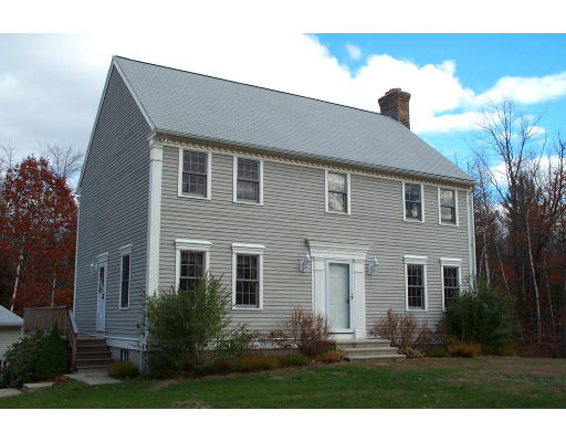 309 Townsend Hill Road Townsend, MA 01469 - Photo 1 of 1 a front view of a house with a yard