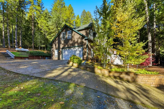 a view of a house with basketball court