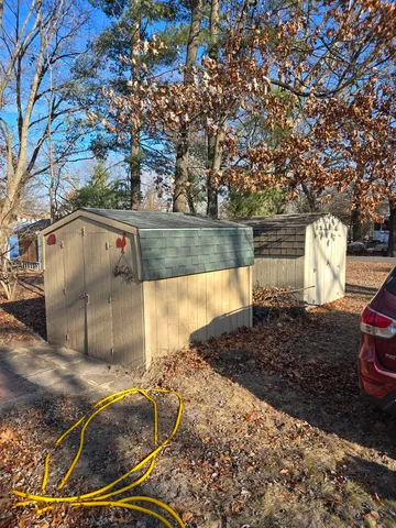 a view of a backyard of the house