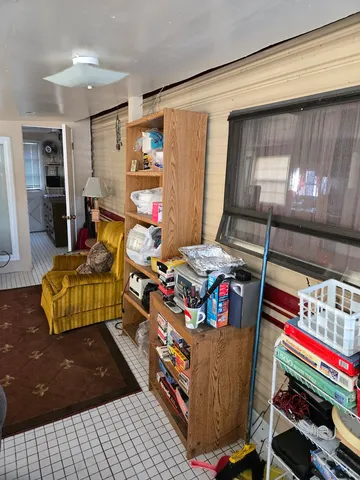 a room with furniture and a rug