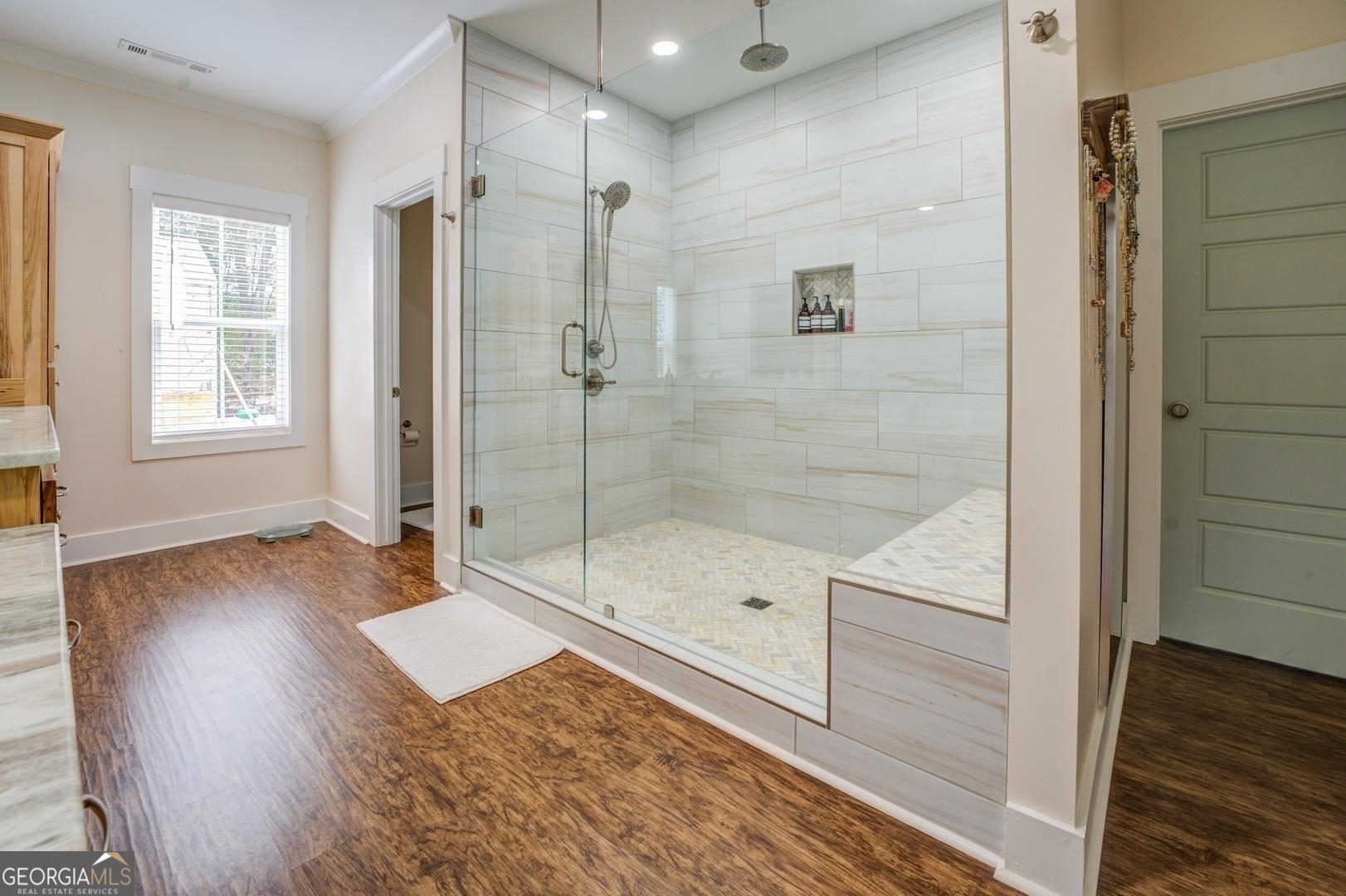 3060 Eatonton Road Madison, GA 30650 - Photo 26 of 65 a bathroom with a shower and a bathtub
