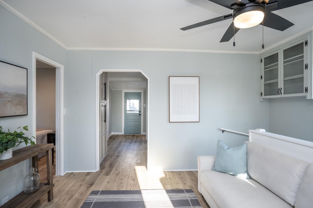 127 Pinehurst Drive Wareham, MA 02571 - Photo 12 of 40 a living room with furniture and a rug