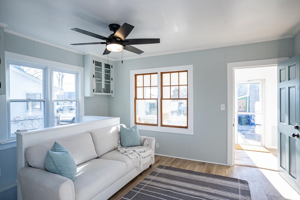 127 Pinehurst Drive Wareham, MA 02571 - Photo 15 of 40 a living room with furniture and a window