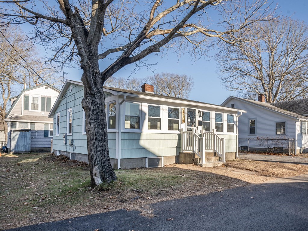 127 Pinehurst Drive Wareham, MA 02571 - Photo 2 of 40 front view of a house with a yard