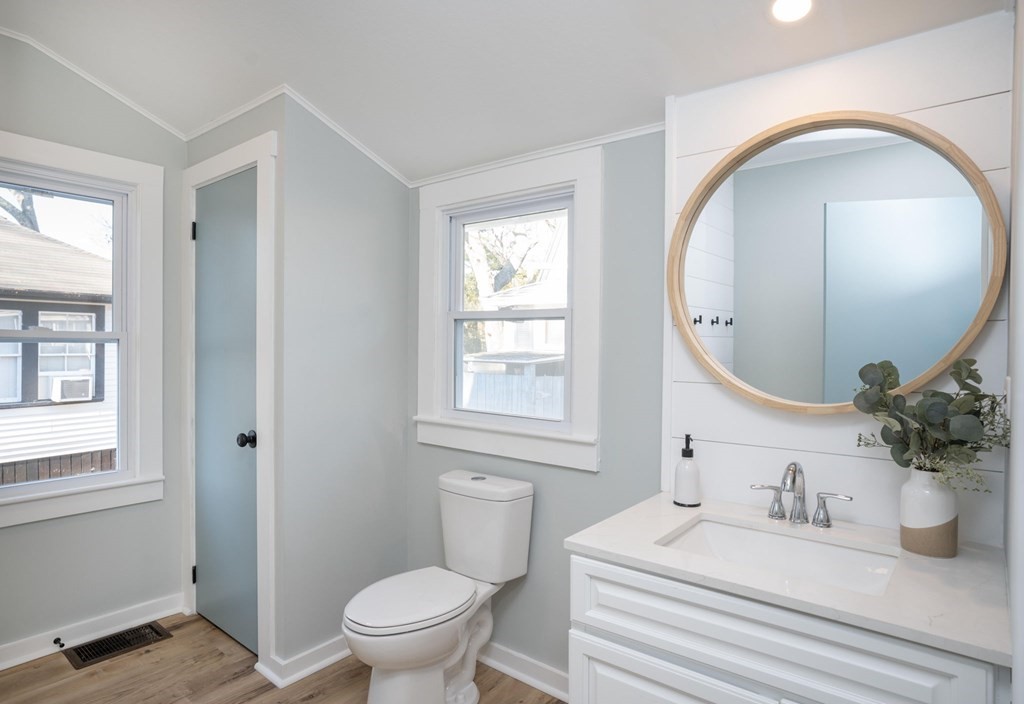 127 Pinehurst Drive Wareham, MA 02571 - Photo 22 of 40 a bathroom with a sink a toilet and a mirror