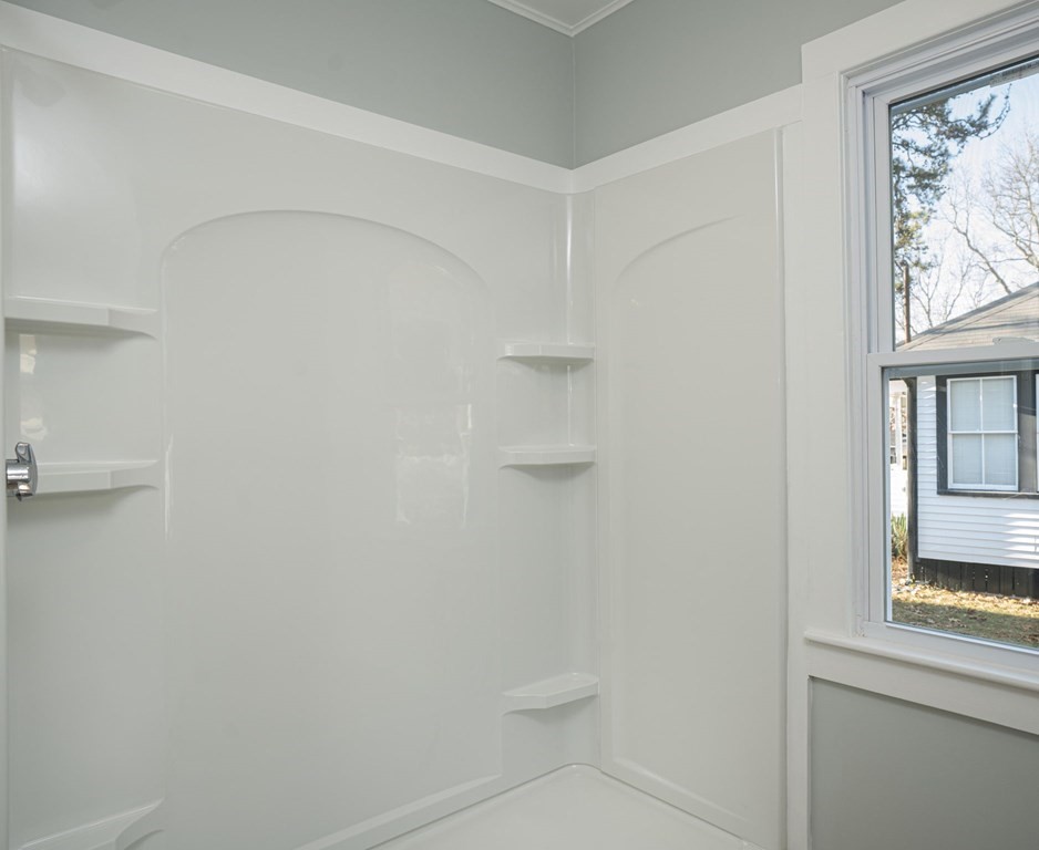 127 Pinehurst Drive Wareham, MA 02571 - Photo 23 of 40 a white toilet sitting next to a window