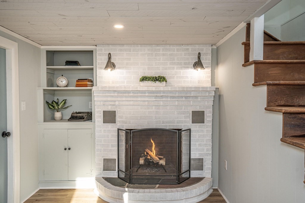 127 Pinehurst Drive Wareham, MA 02571 - Photo 30 of 40 a living room with furniture and a fireplace