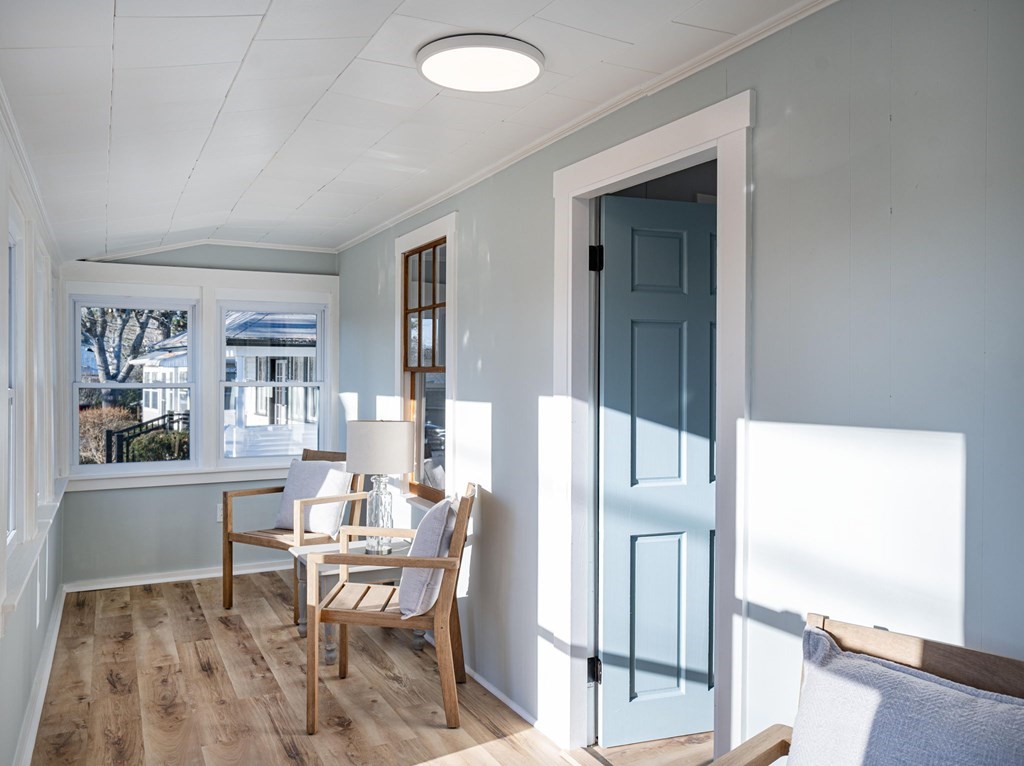 127 Pinehurst Drive Wareham, MA 02571 - Photo 6 of 40 a living room with furniture and a table