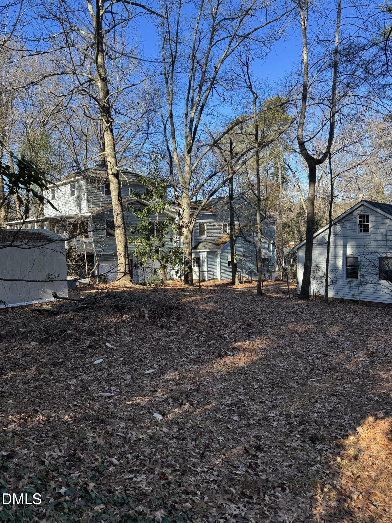2601 Van Dyke Avenue Raleigh, NC 27607 - Photo 1 of 10 a view of a backyard with large trees