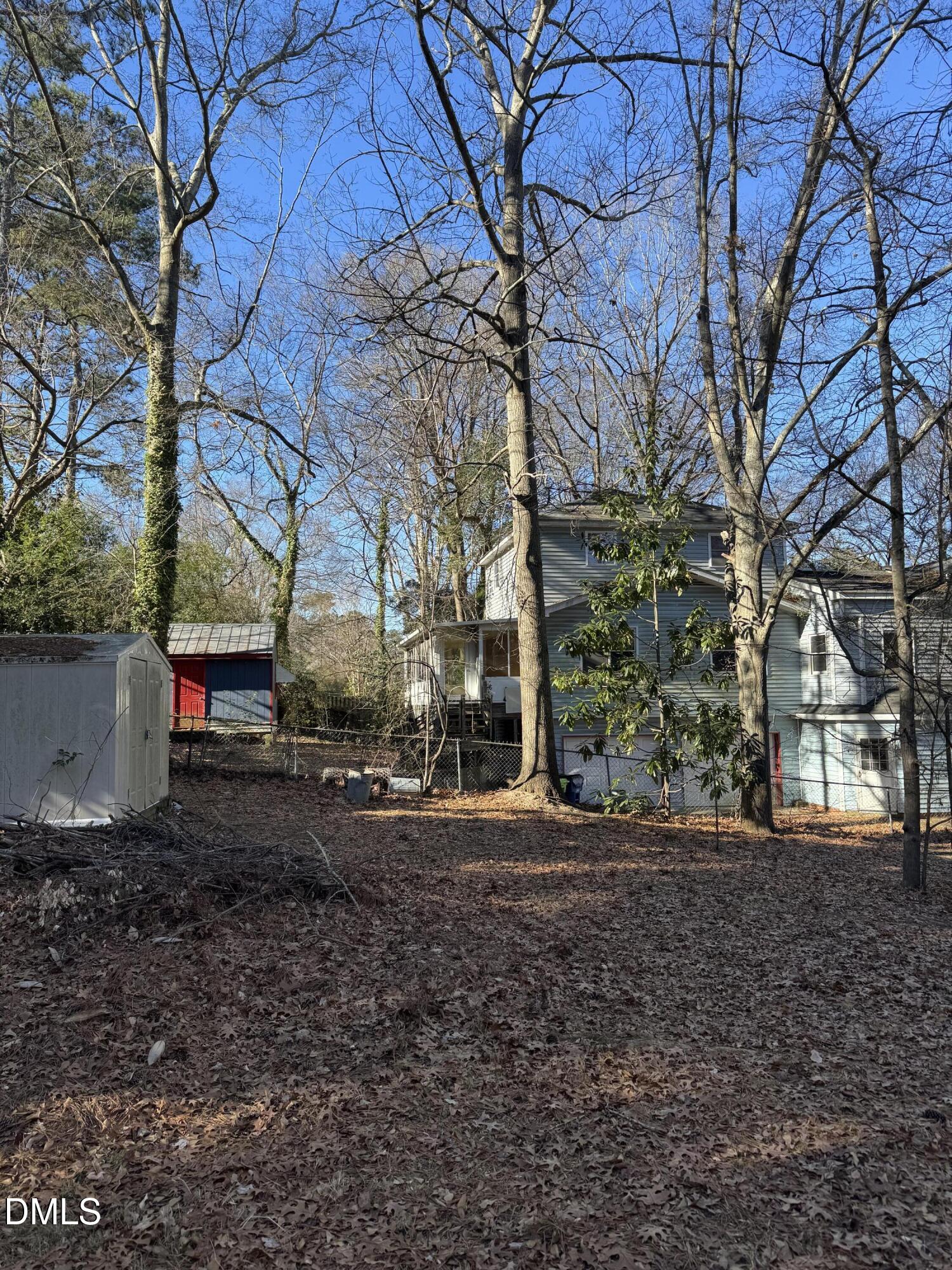 2601 Van Dyke Avenue Raleigh, NC 27607 - Photo 5 of 10 a backyard of a house with lots of green space