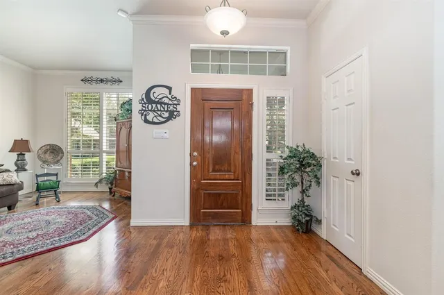 a view of livingroom with furniture and hardwood floor