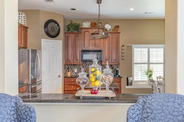 a view of living room with furniture and window