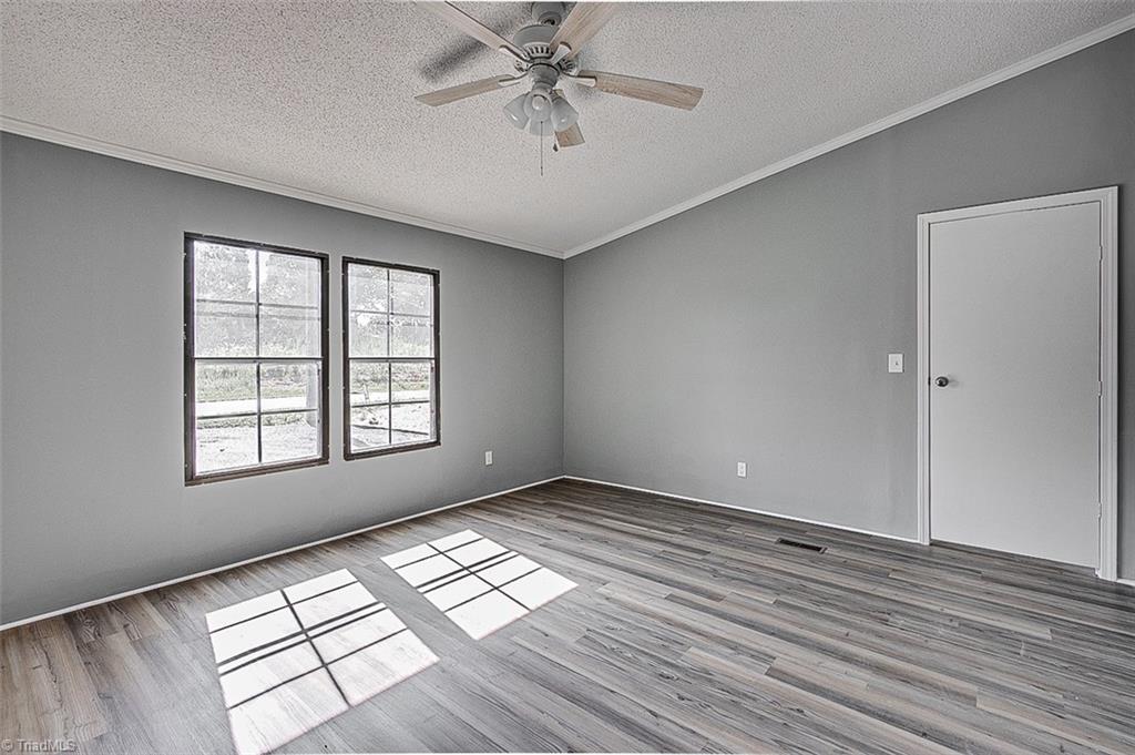 636 Ward Road Staley, NC 27355 - Photo 15 of 33 Primary Bedrrom