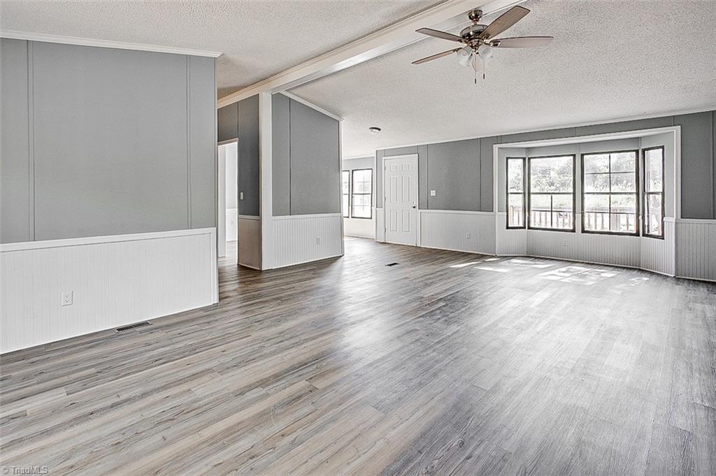 636 Ward Road Staley, NC 27355 - Photo 6 of 33 View of Great Room from back of house w/o furniture