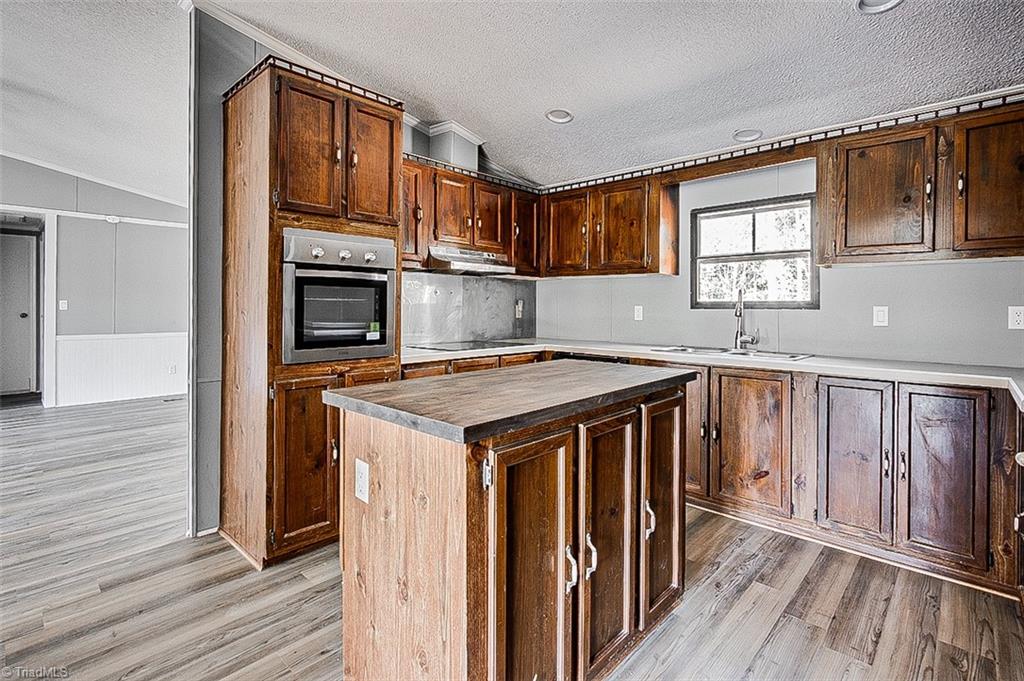636 Ward Road Staley, NC 27355 - Photo 9 of 33 View pf Kitchen from Dining Room