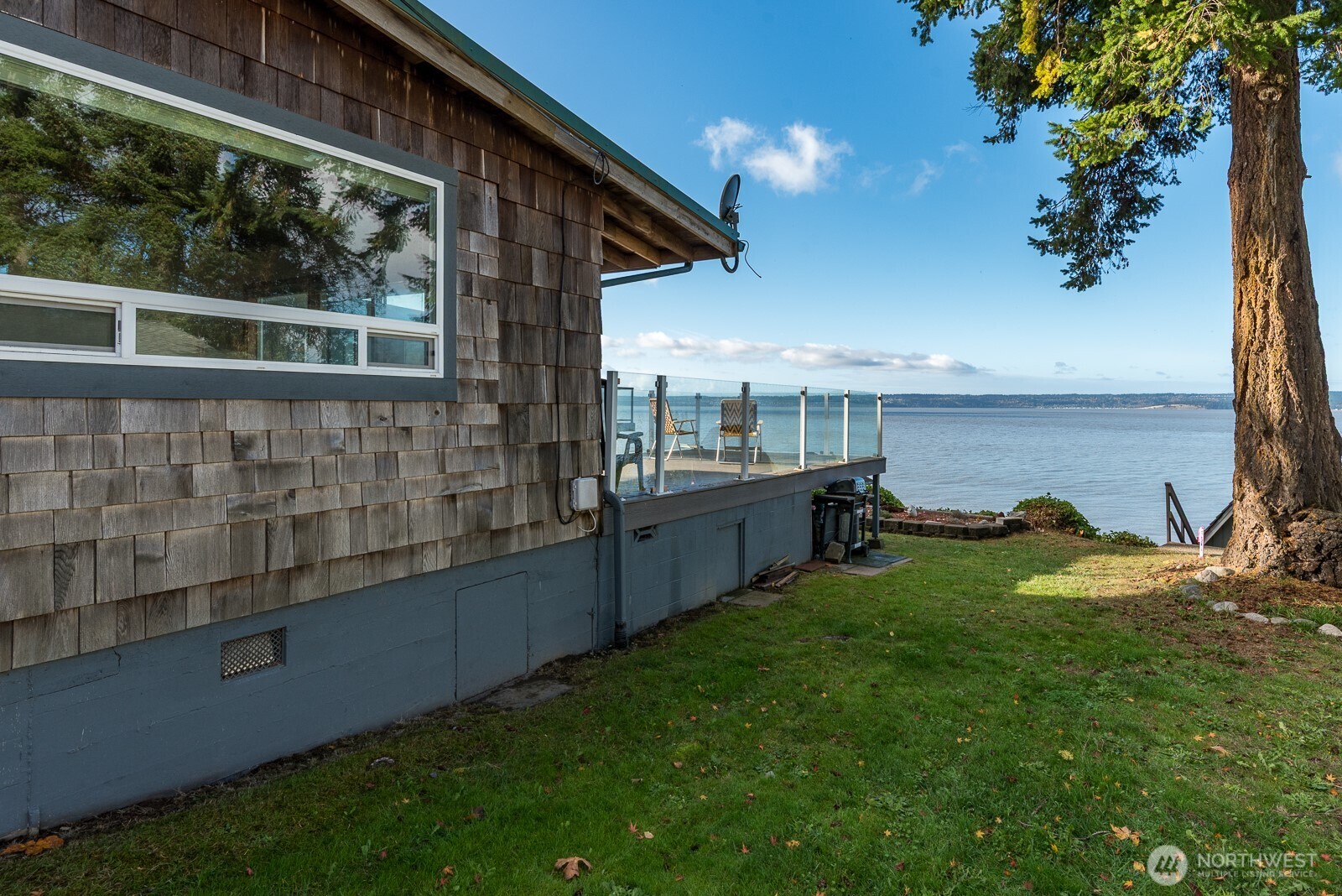 19422 Soundview Drive Northwest Stanwood, WA 98292 - Photo 2 of 33 a view of a house with backyard and sitting area