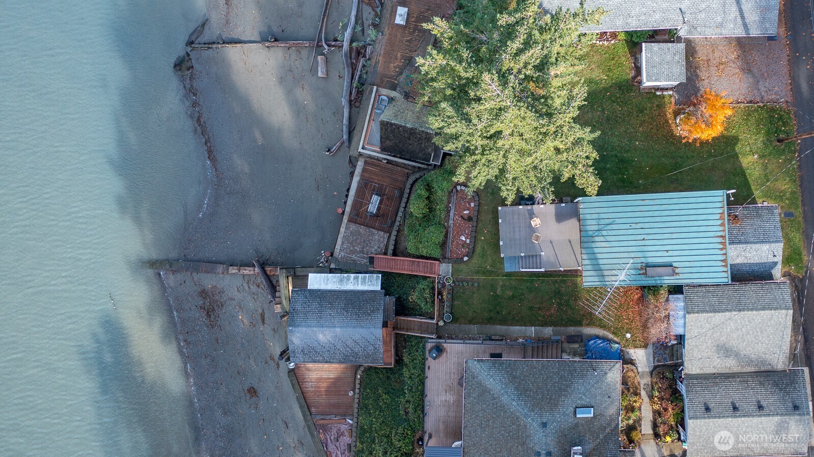 19422 Soundview Drive Northwest Stanwood, WA 98292 - Photo 3 of 33 an aerial view of residential houses with outdoor space