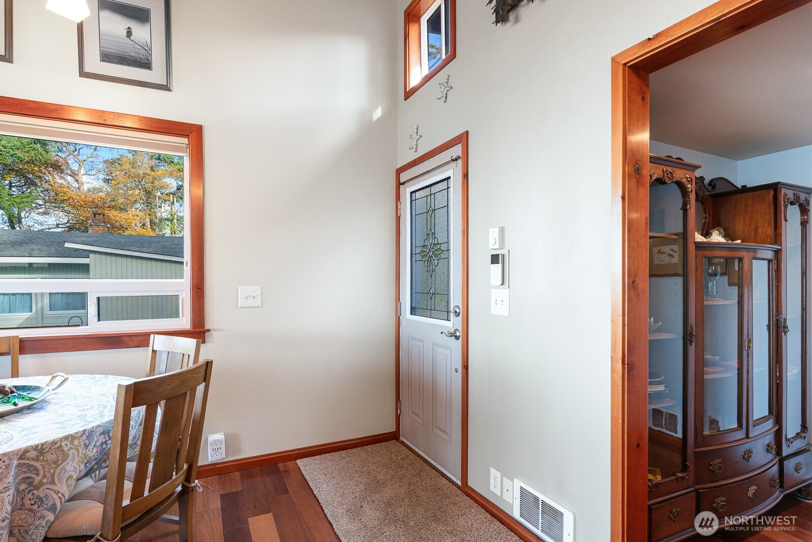 19422 Soundview Drive Northwest Stanwood, WA 98292 - Photo 8 of 33 a view of a hallway with furniture and front door