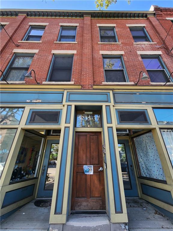5237 Butler Street, Unit 3 Pittsburgh, PA 15201 - Photo 1 of 6 a view of a building with a door