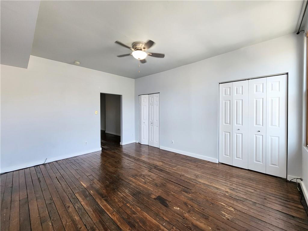 5237 Butler Street, Unit 3 Pittsburgh, PA 15201 - Photo 2 of 6 a view of an empty room with wooden floor
