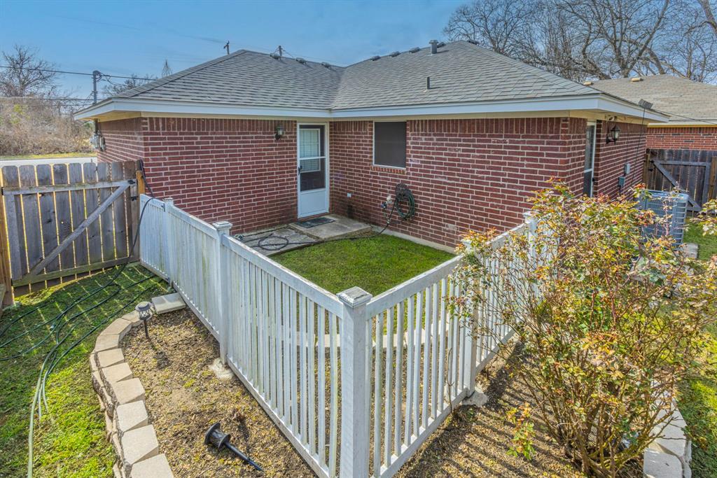 1202 Spring Street Waco, TX 76704 - Photo 13 of 16 a view of a backyard