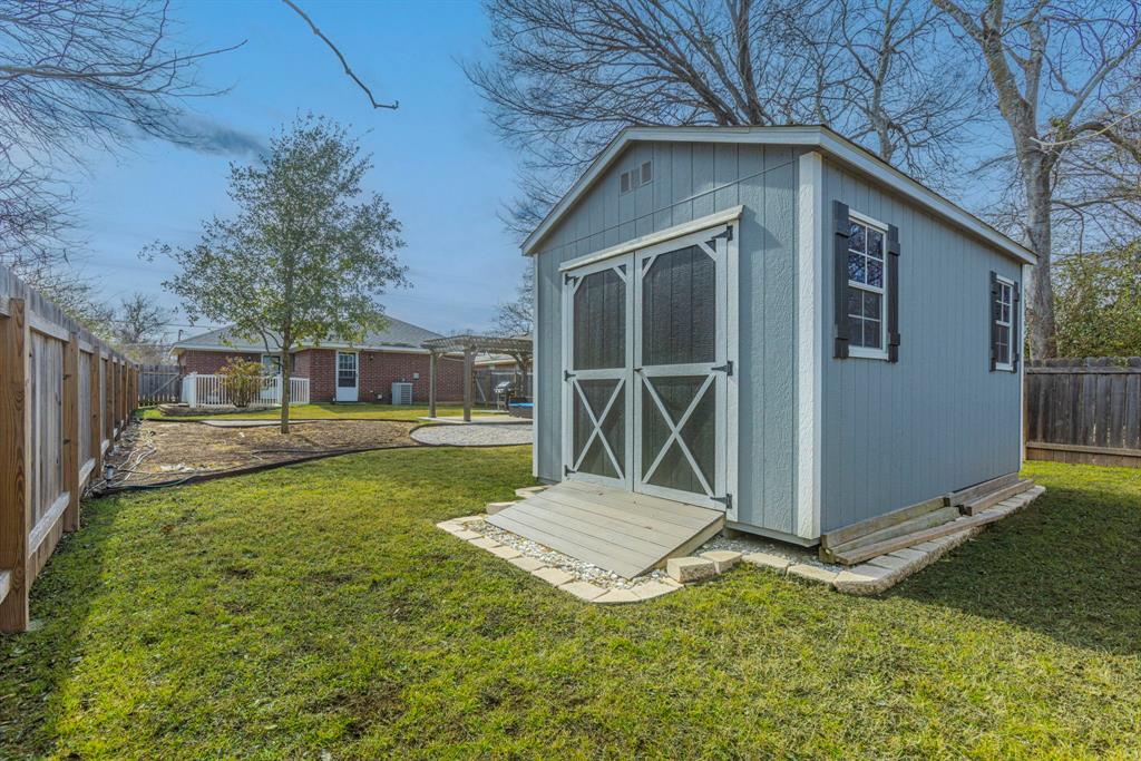 1202 Spring Street Waco, TX 76704 - Photo 14 of 16 a view of backyard of the house