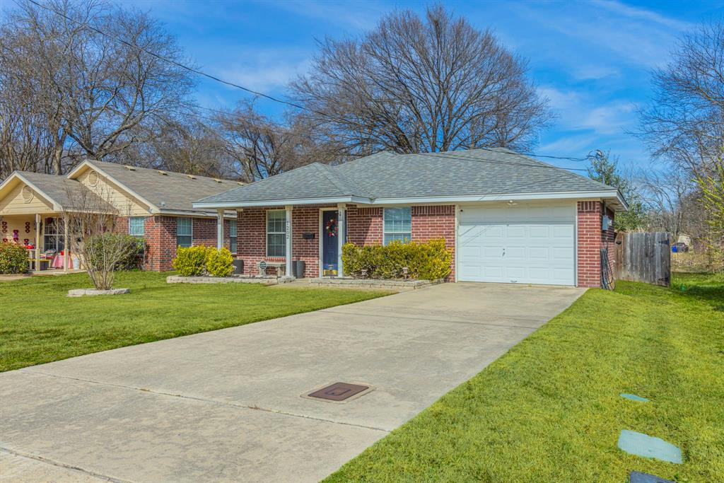 1202 Spring Street Waco, TX 76704 - Photo 16 of 16 a view of a house with a yard