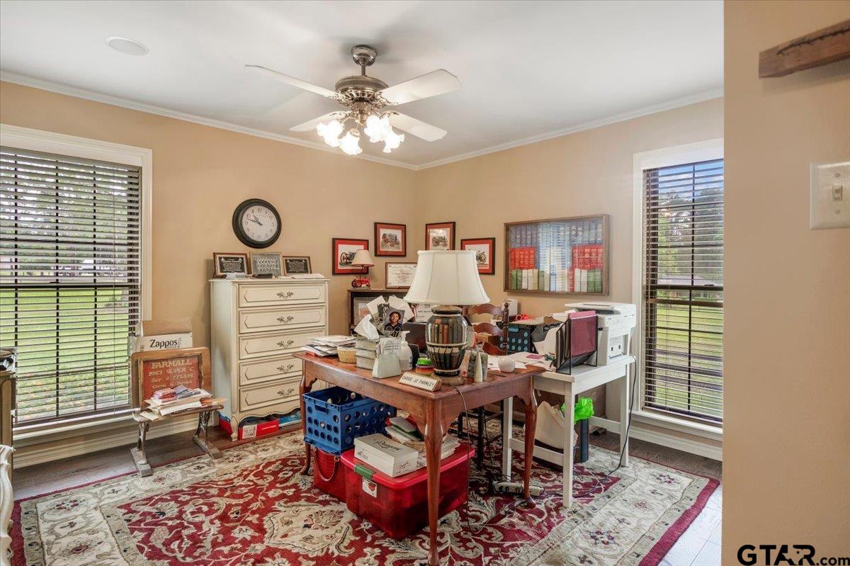 15246 7 League Road Tyler, TX 75703 - Photo 17 of 43 a living room with furniture a rug and a window